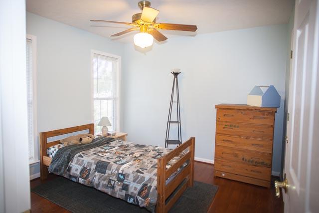 4086 Trinity Road Franklin, TN 37067 - Photo 11 of 20 a bedroom with a bed and a chandelier
