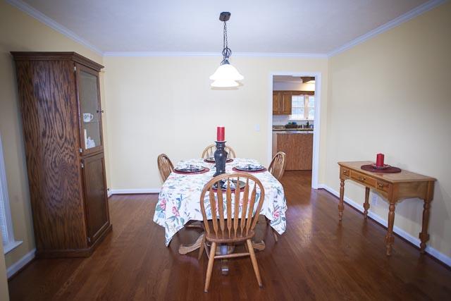 4086 Trinity Road Franklin, TN 37067 - Photo 5 of 20 a view of a dining room with furniture and wooden floor