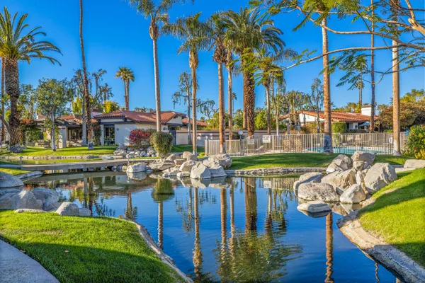a view of an chairs and tables in the balcony