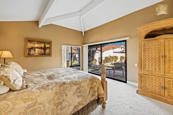 a spacious bathroom with a double vanity sink mirror double shower and a bathtub