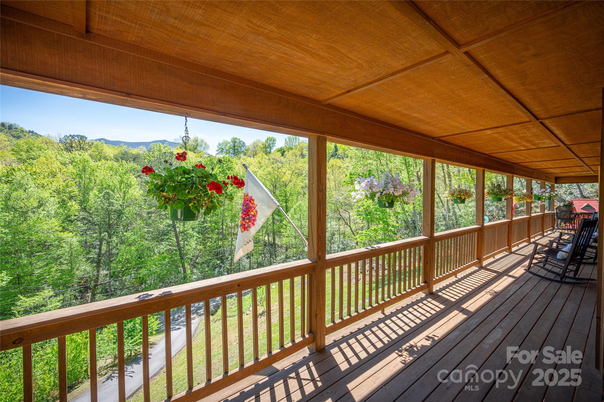 234 Deer Run Road Canton, NC 28716 - Photo 12 of 48 a view of a balcony with wooden floor