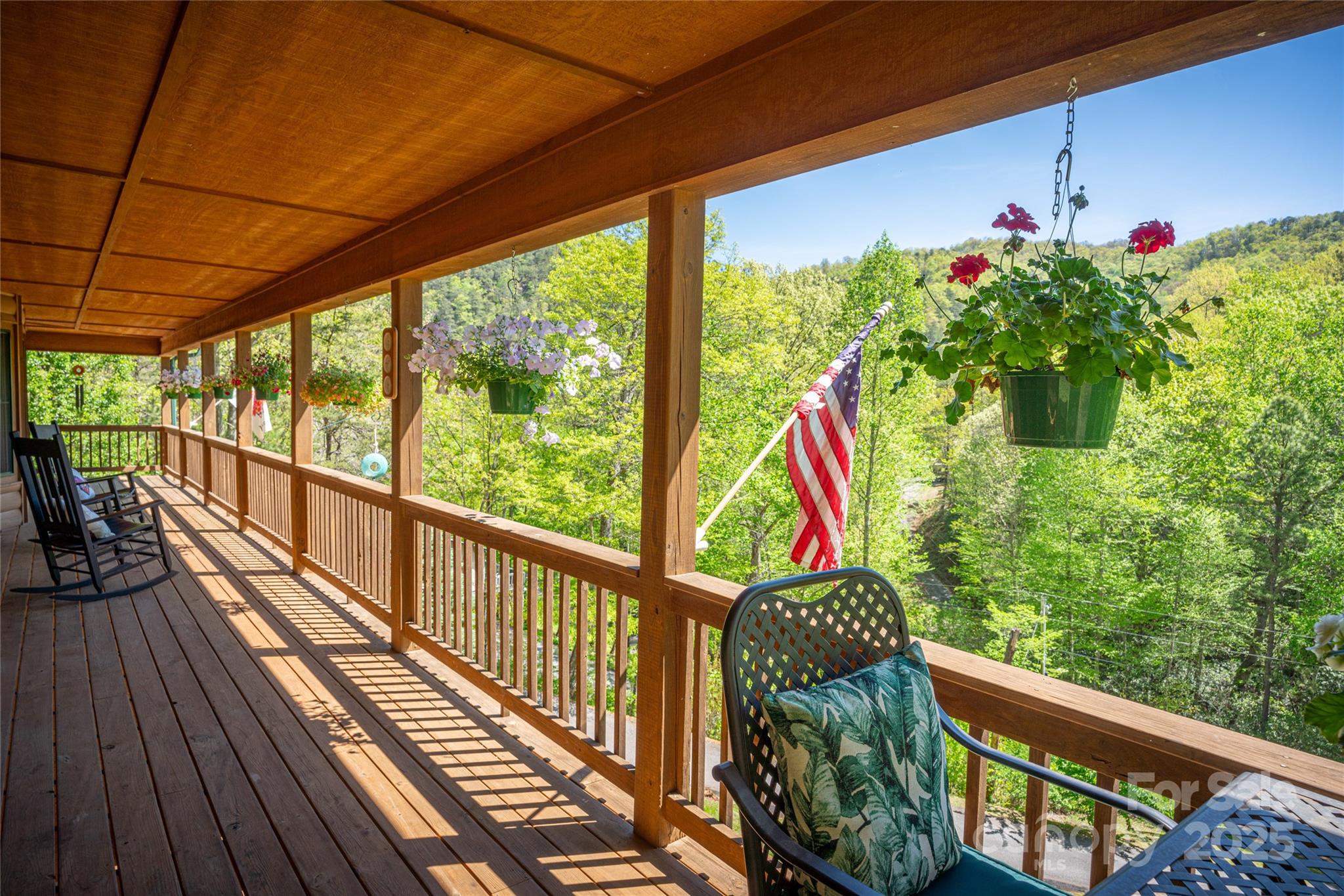 234 Deer Run Road Canton, NC 28716 - Photo 13 of 48 a balcony with wooden floor and outdoor space