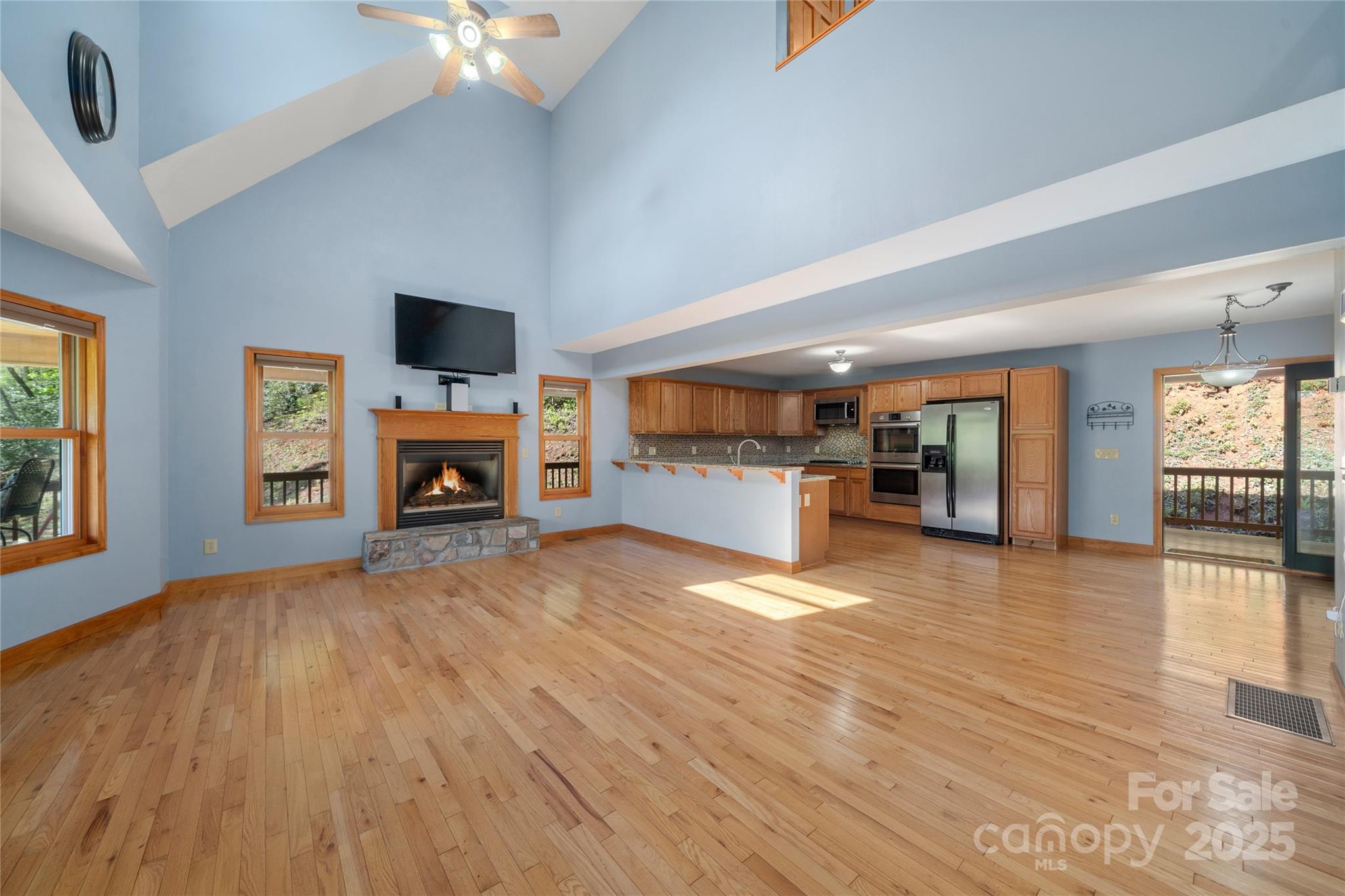 234 Deer Run Road Canton, NC 28716 - Photo 16 of 48 a view of living room with furniture and flat screen tv