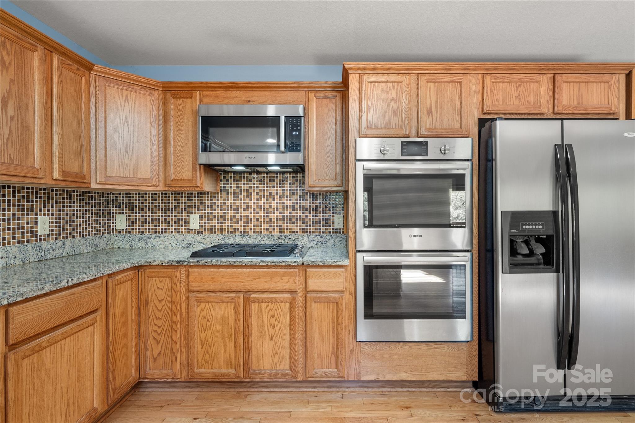 234 Deer Run Road Canton, NC 28716 - Photo 22 of 48 a kitchen with stainless steel appliances granite countertop a refrigerator and a sink