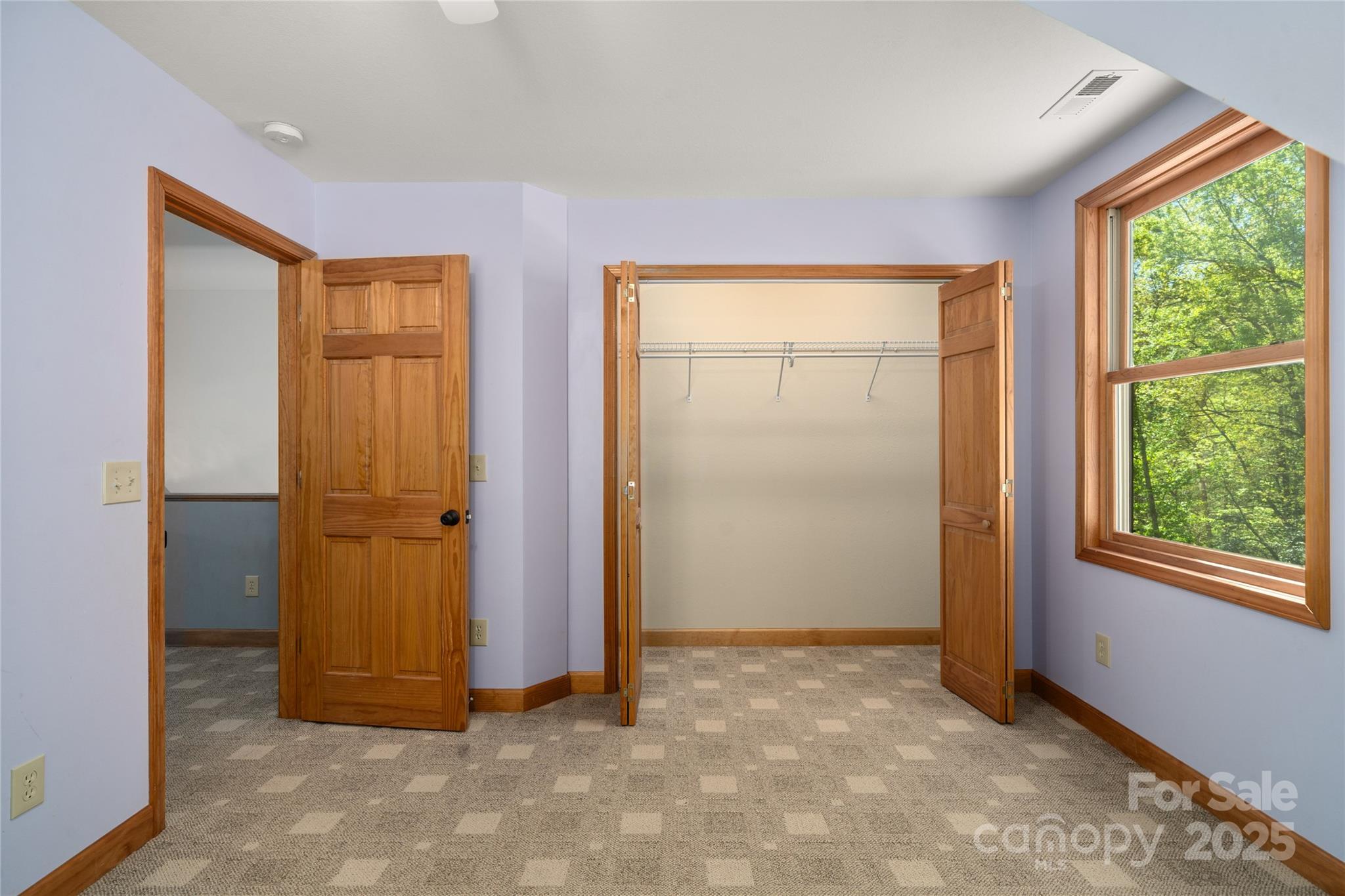 234 Deer Run Road Canton, NC 28716 - Photo 32 of 48 an empty room with windows and closet