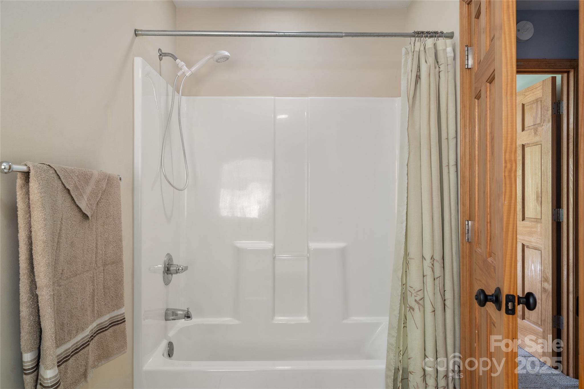 234 Deer Run Road Canton, NC 28716 - Photo 36 of 48 a bathroom with a shower and a bath tub