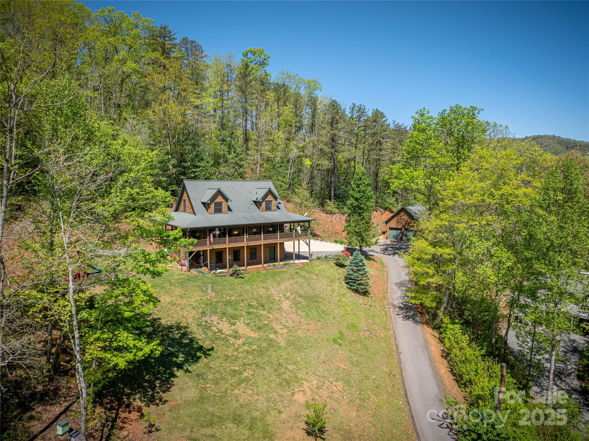 234 Deer Run Road Canton, NC 28716 - Photo 5 of 48 a view of a house with a yard