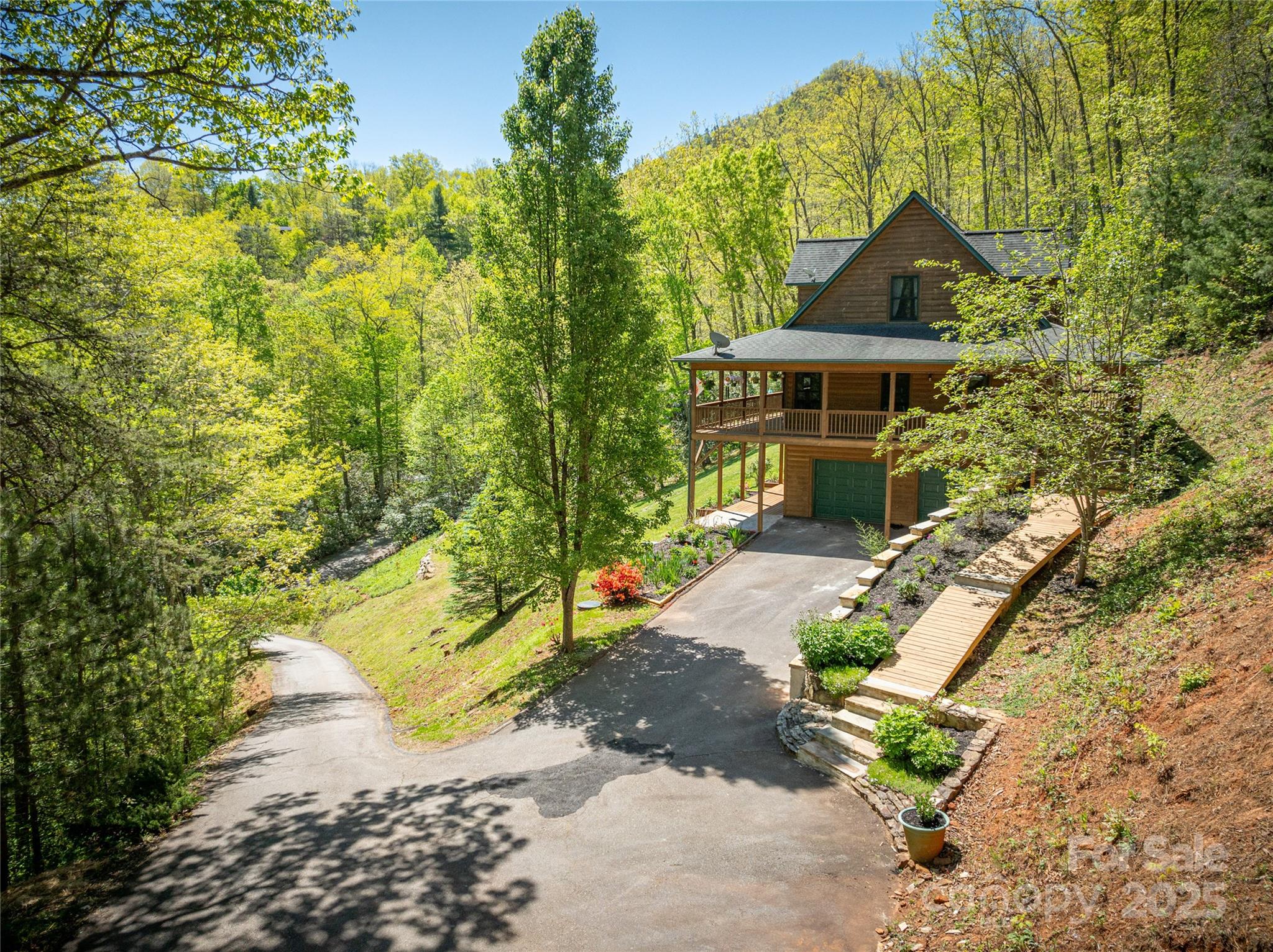 234 Deer Run Road Canton, NC 28716 - Photo 6 of 48 a front view of a house with a yard
