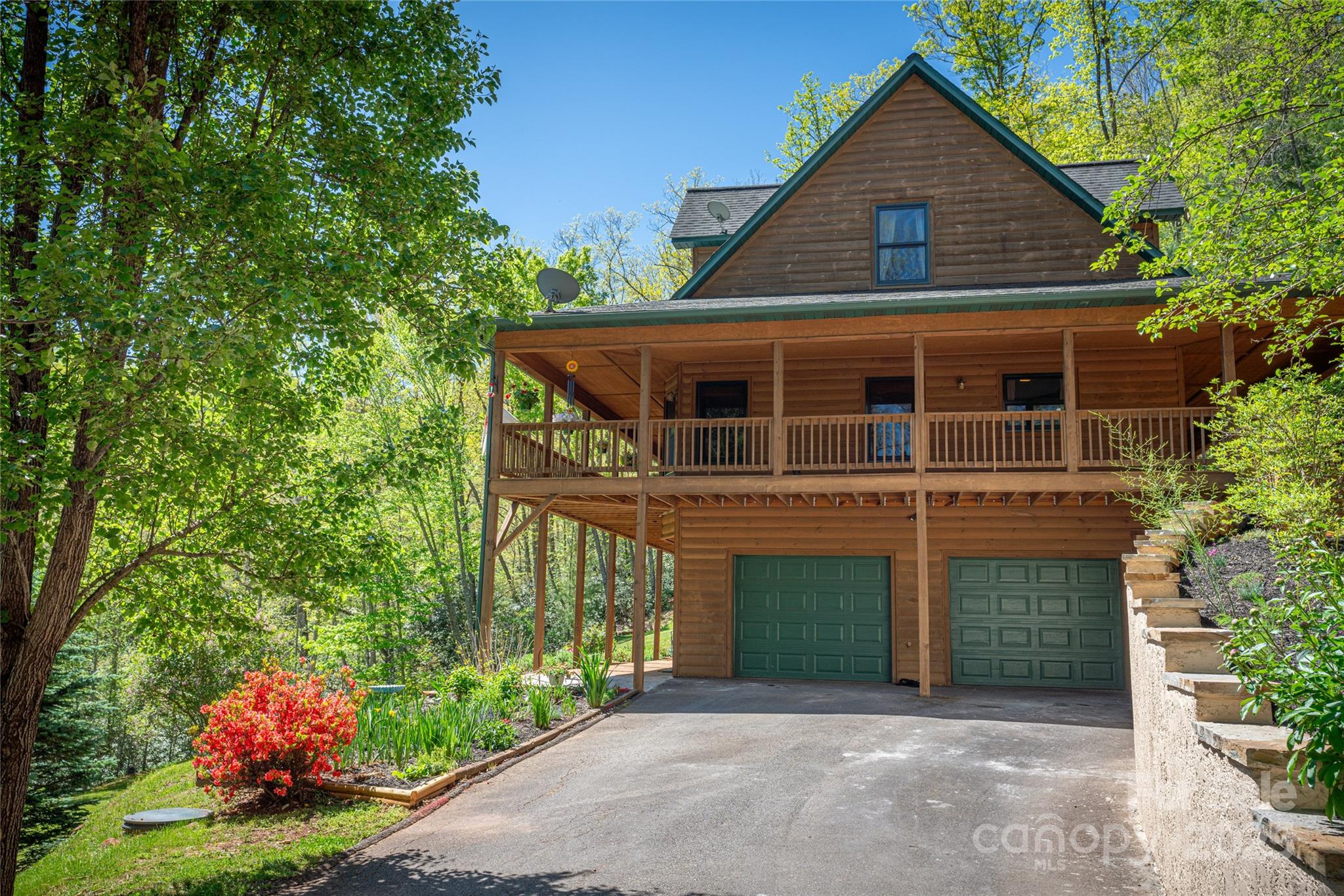 234 Deer Run Road Canton, NC 28716 - Photo 7 of 48 a front view of a house with a yard