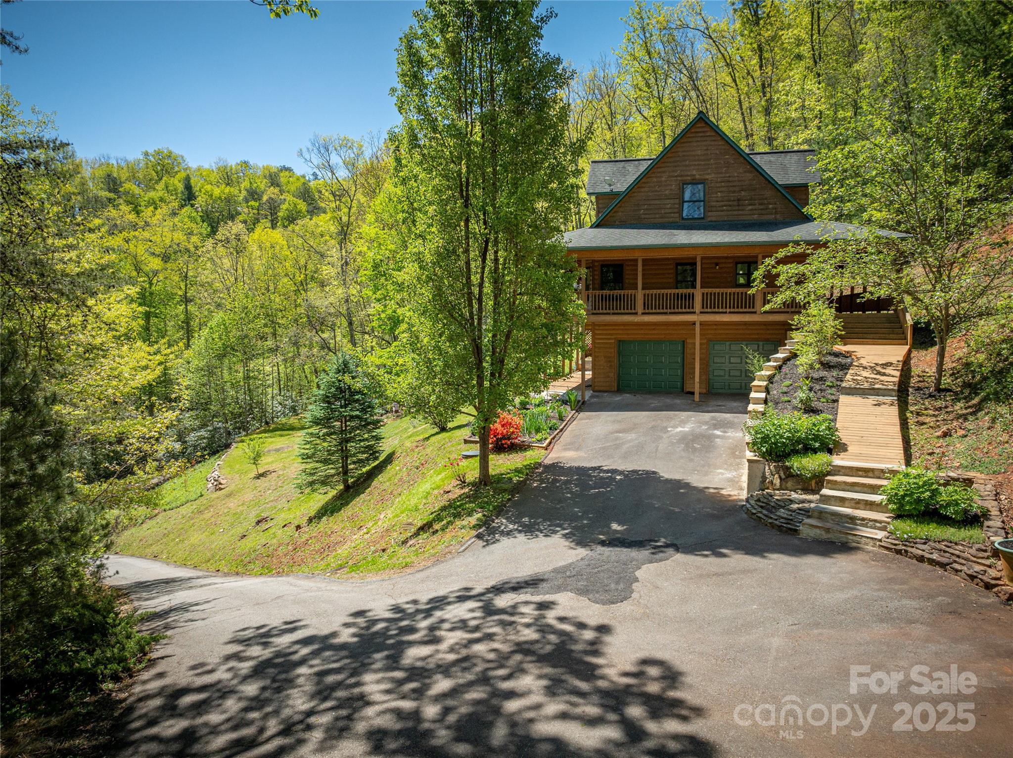 234 Deer Run Road Canton, NC 28716 - Photo 9 of 48 a front view of a house with a yard