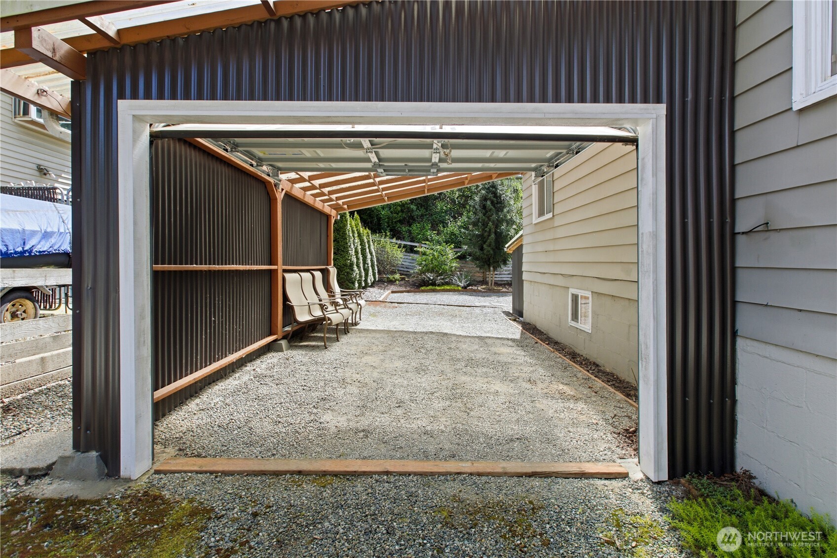 2307 Southwest Myrtle Street Seattle, WA 98106 - Photo 30 of 30 a view of backyard with small cabin and wooden fencing