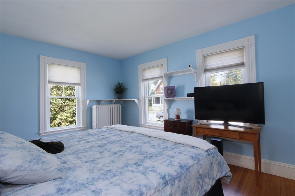 2 High Street Middleboro, MA 02346 - Photo 24 of 41 a bedroom with a bed and a flat screen tv
