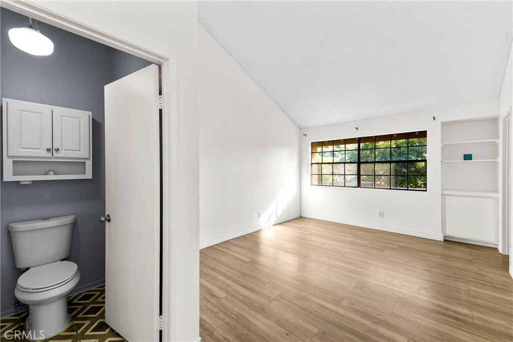 4140 Workman Mill Road, Unit 191 Whittier, CA 90601 - Photo 9 of 21 a bathroom with a toilet sink and a window