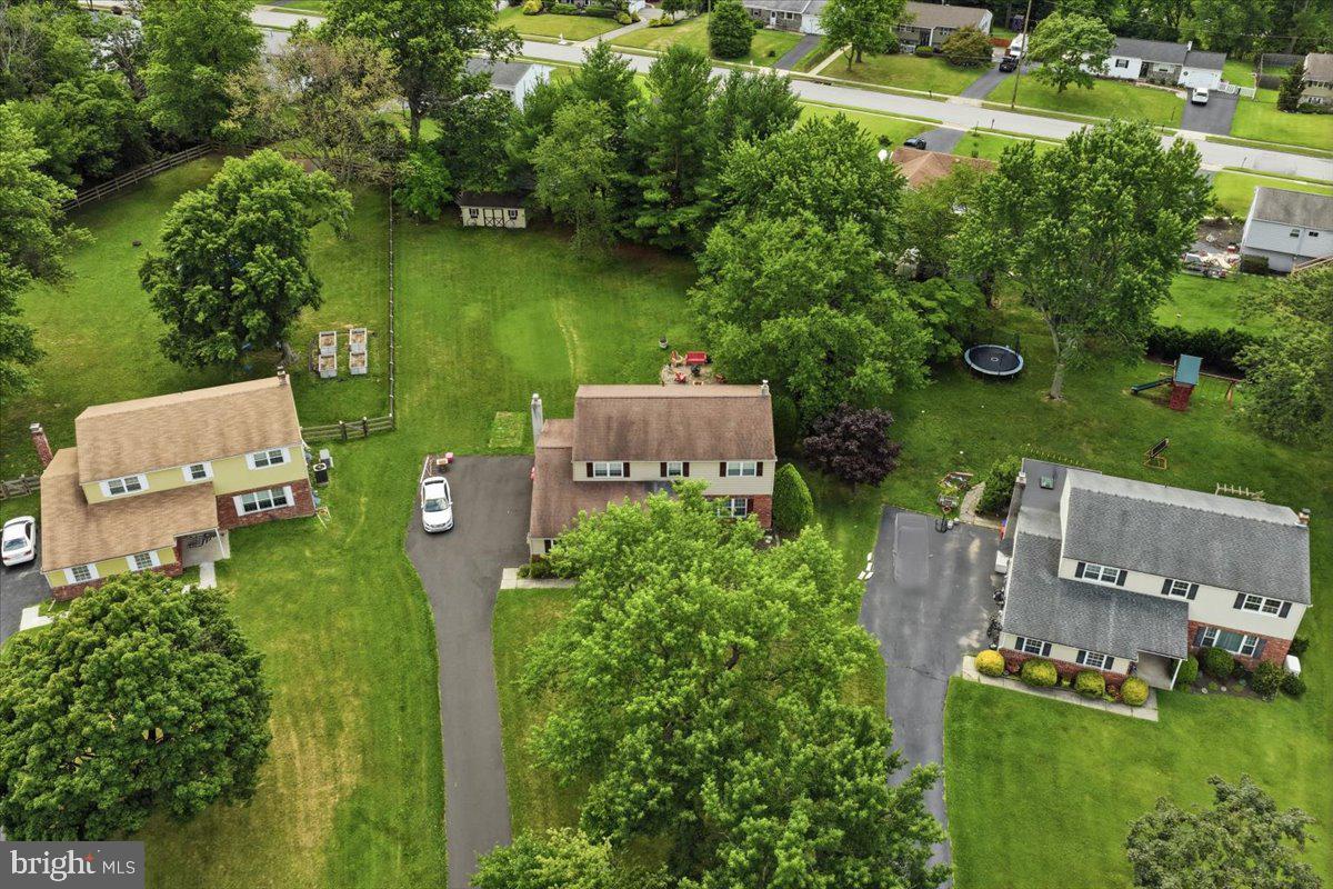 148 Regency Drive Eagleville, PA 19403 - Photo 37 of 42 Charming homes nestled in lush greenery.