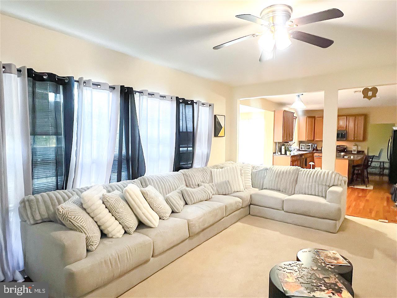 1649 Thorndale Road Breinigsville, PA 18031 - Photo 4 of 19 a living room with furniture and a large mirror