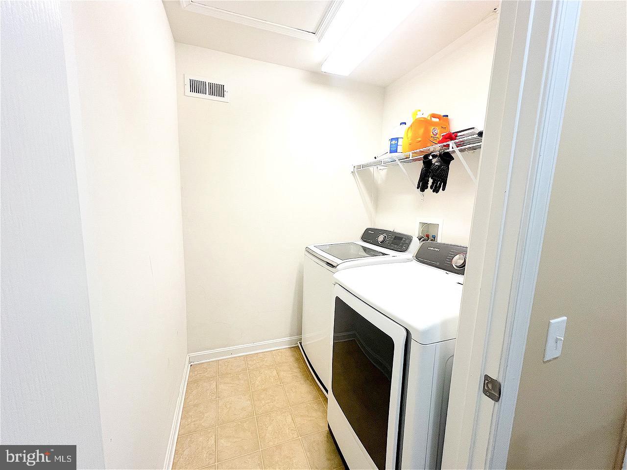 1649 Thorndale Road Breinigsville, PA 18031 - Photo 9 of 19 a utility room with dryer and washer