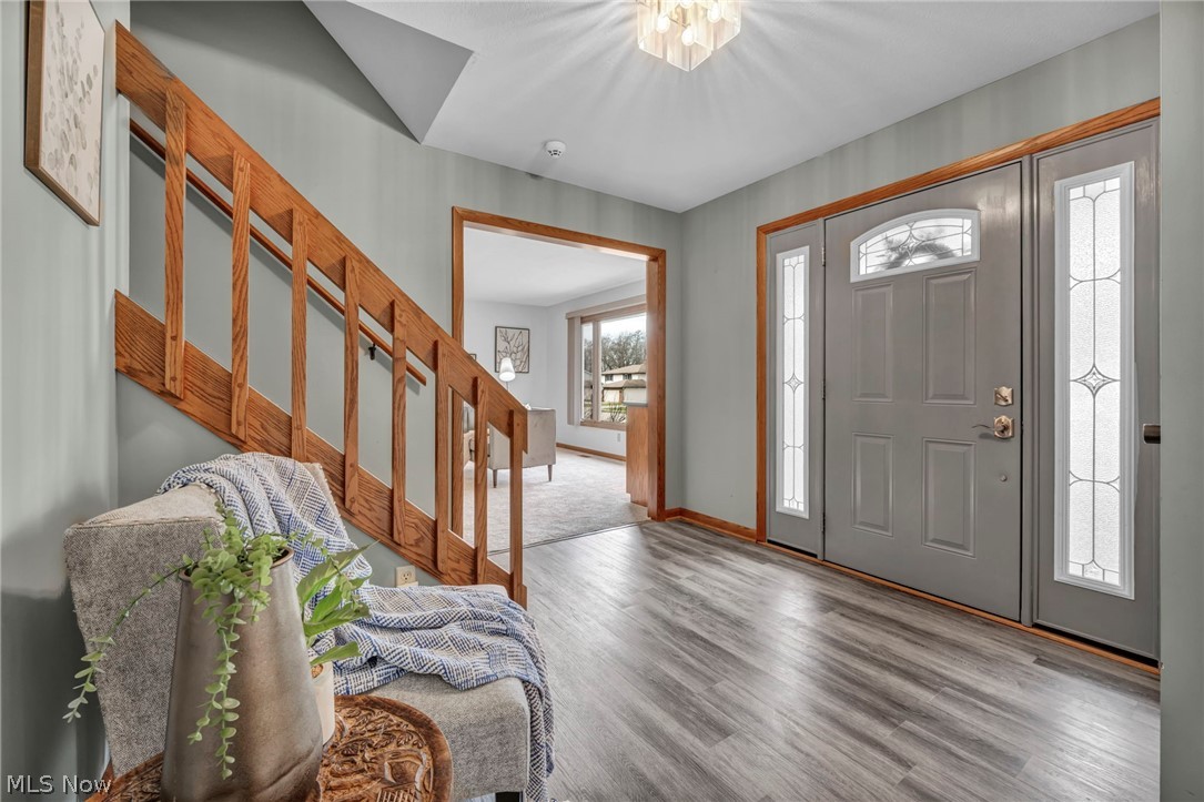 5162 Johnnycake Ridge Northeast Canton, OH 44705 - Photo 7 of 50 Entrance foyer with wood finished floors and suspended lighting