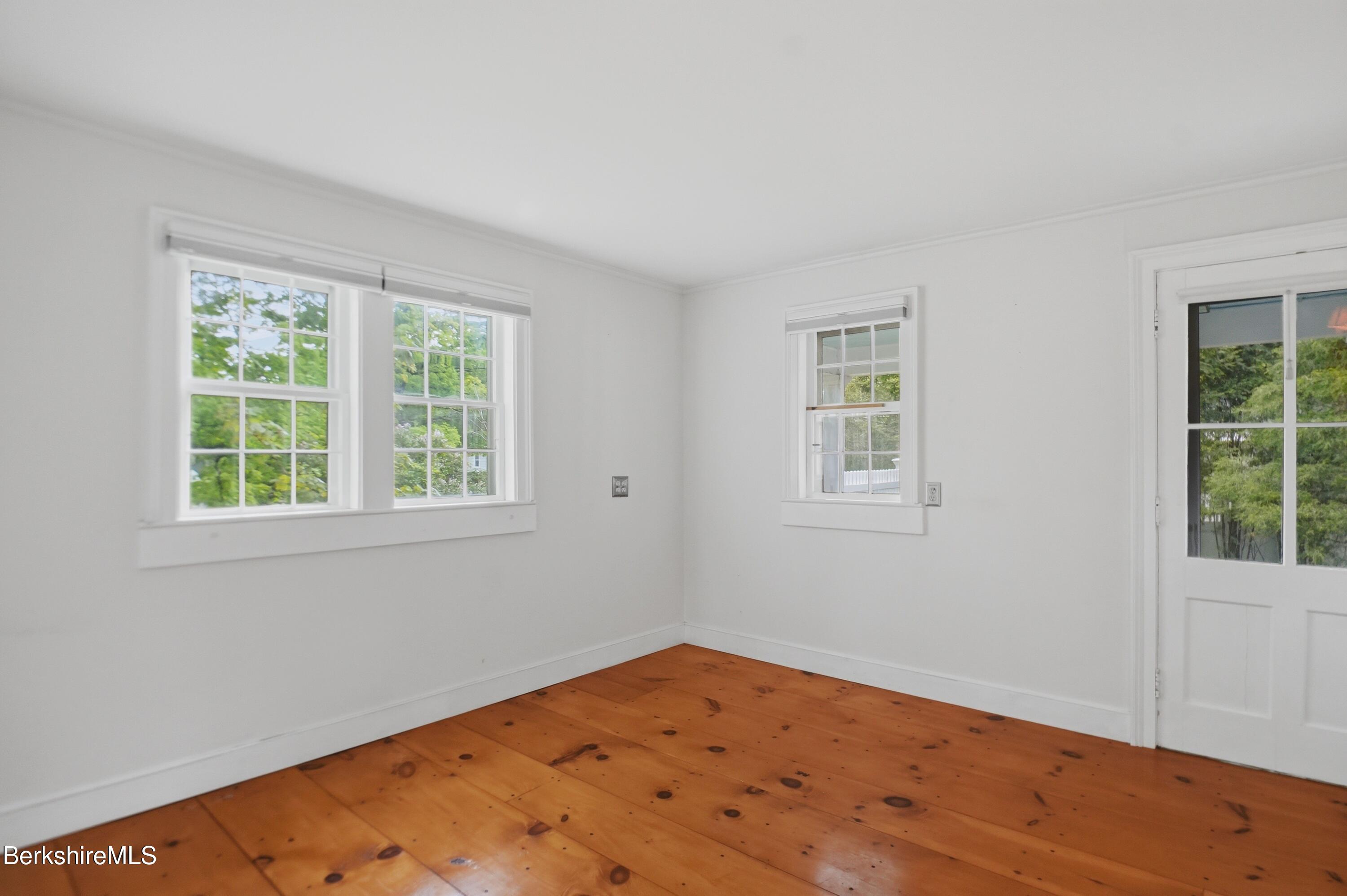 4 Stockbridge Road West Stockbridge, MA 01266 - Photo 42 of 94 a view of empty room with wooden floor and fan