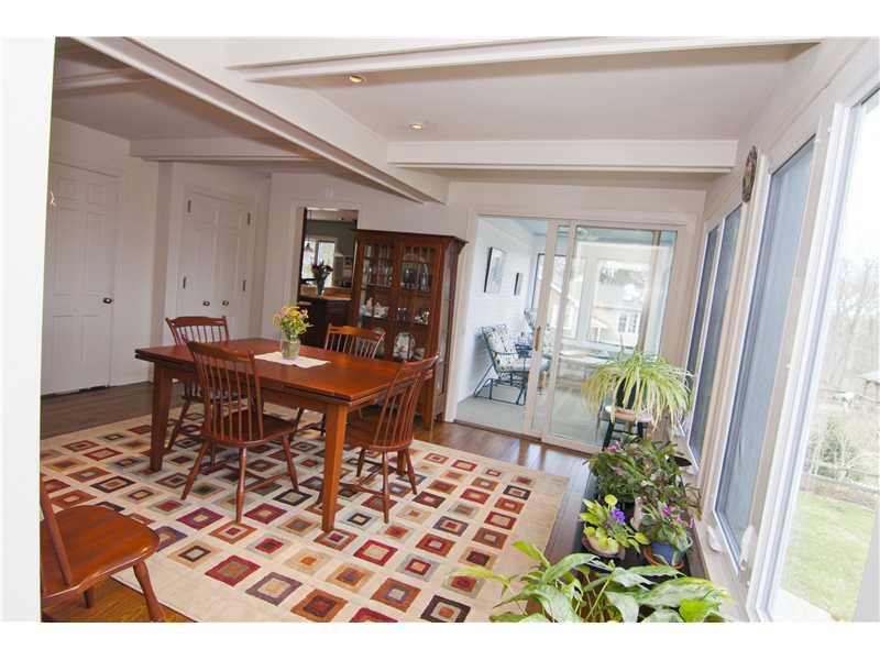 35 Newgate Road Pittsburgh, PA 15202 - Photo 14 of 25 Dining Room. Alternate view with beamed ceiling and three-seasons room.