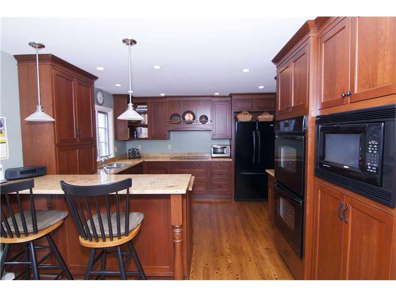35 Newgate Road Pittsburgh, PA 15202 - Photo 15 of 25 Kitchen. Features newer HW floor, cherry cabinets, granite counters. All appliances convey.