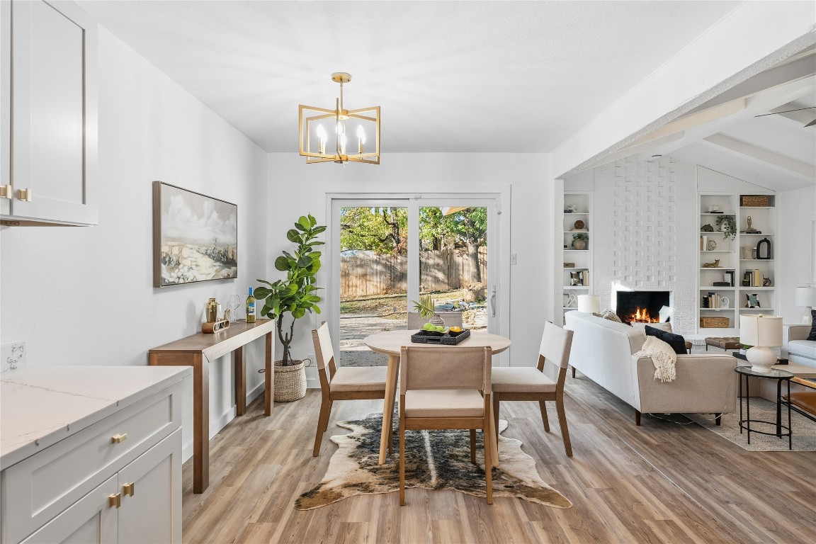 6710 Kings Point West Austin, TX 78723 - Photo 17 of 40 a living room with furniture and a wooden floor
