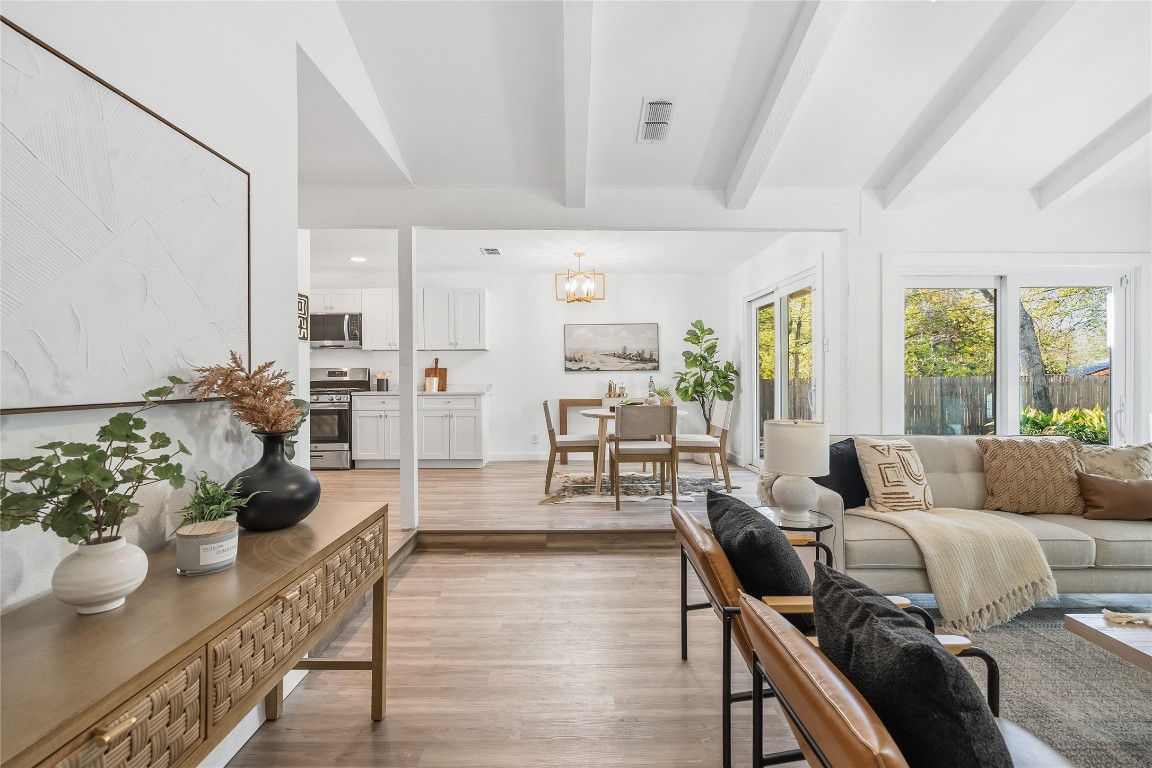 6710 Kings Point West Austin, TX 78723 - Photo 7 of 40 a living room with furniture and wooden floor