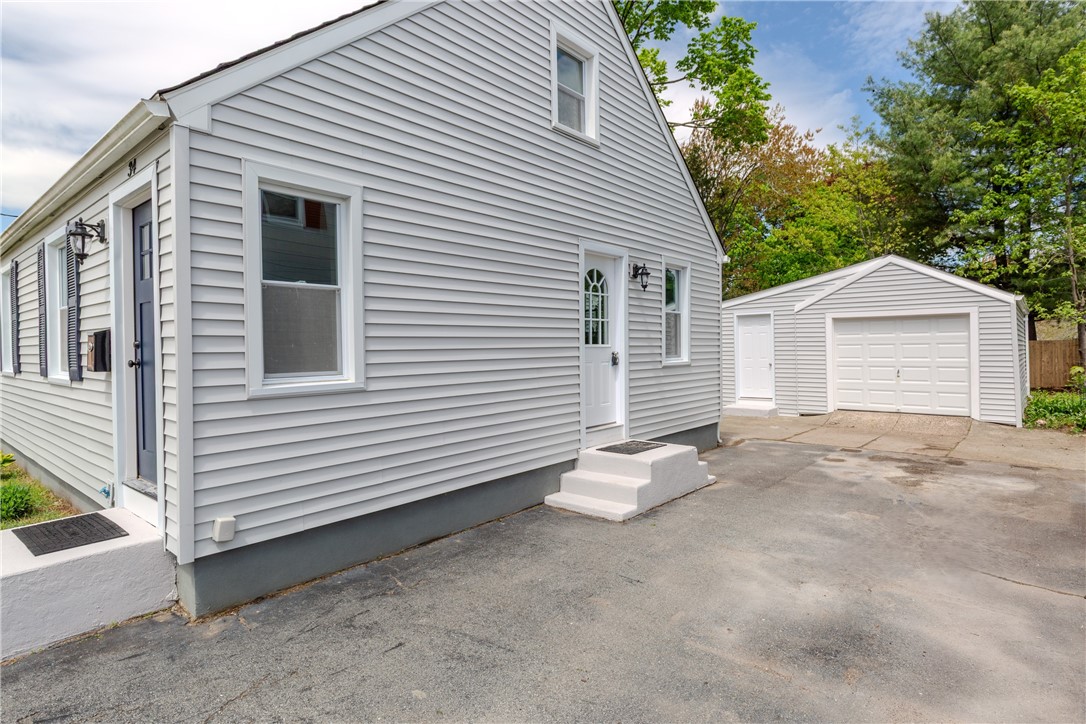 34 Wasaga Road Pawtucket, RI 02861 - Photo 27 of 30 Driveway and side entrance