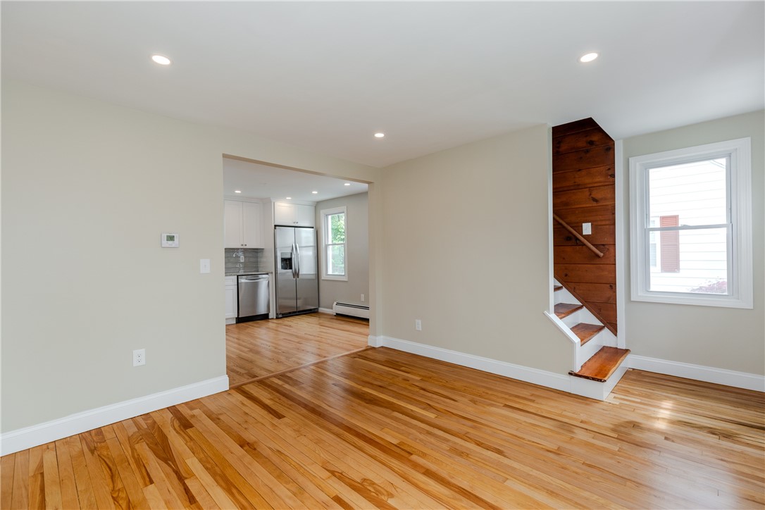 34 Wasaga Road Pawtucket, RI 02861 - Photo 6 of 30 Living room with stair going to upper level bedroom