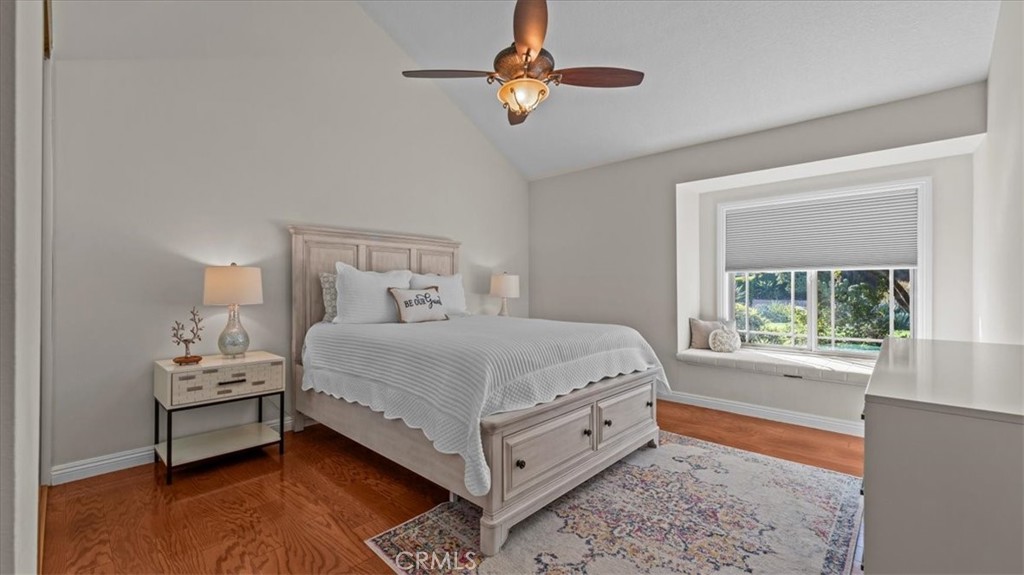 1958 Canyon Close Road Pasadena, CA 91107 - Photo 11 of 40 a bed room with a bed window and a chandelier