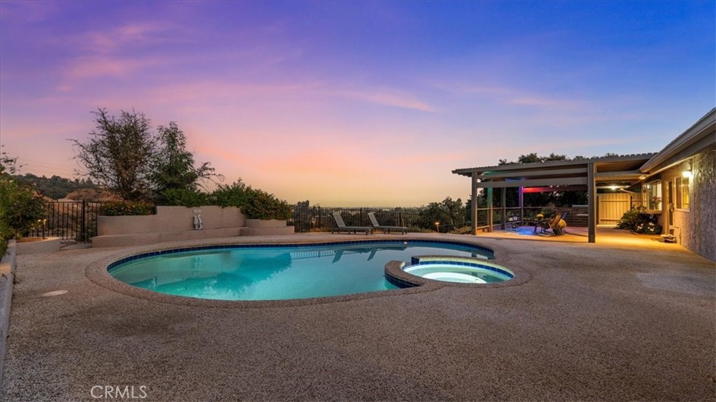 1958 Canyon Close Road Pasadena, CA 91107 - Photo 28 of 40 a swimming pool with outdoor seating and yard