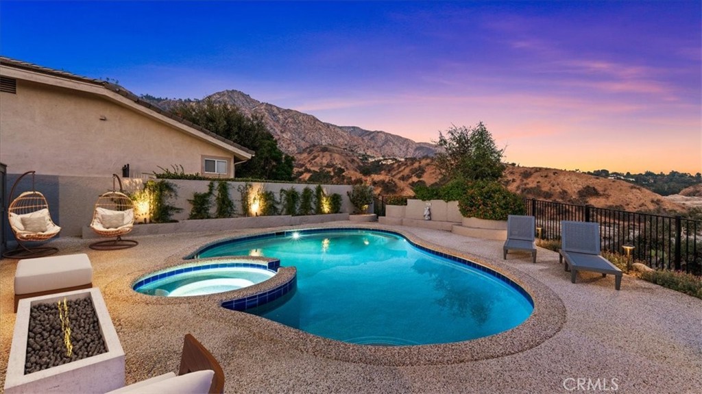 1958 Canyon Close Road Pasadena, CA 91107 - Photo 30 of 40 a view of a swimming pool with a patio
