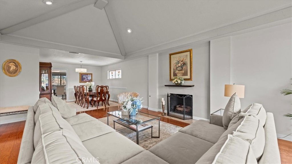 1958 Canyon Close Road Pasadena, CA 91107 - Photo 3 of 40 a living room with furniture dining table and a fireplace