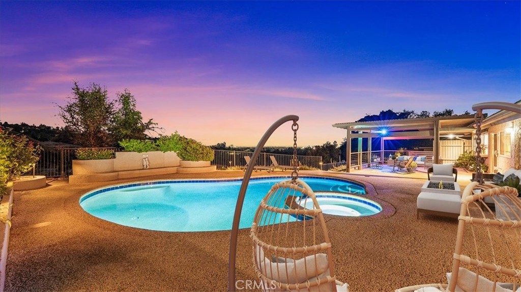 1958 Canyon Close Road Pasadena, CA 91107 - Photo 33 of 40 a view of a swimming pool with a patio