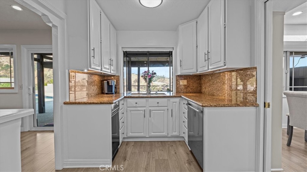 1958 Canyon Close Road Pasadena, CA 91107 - Photo 9 of 40 a kitchen with granite countertop cabinets stainless steel appliances and a counter space