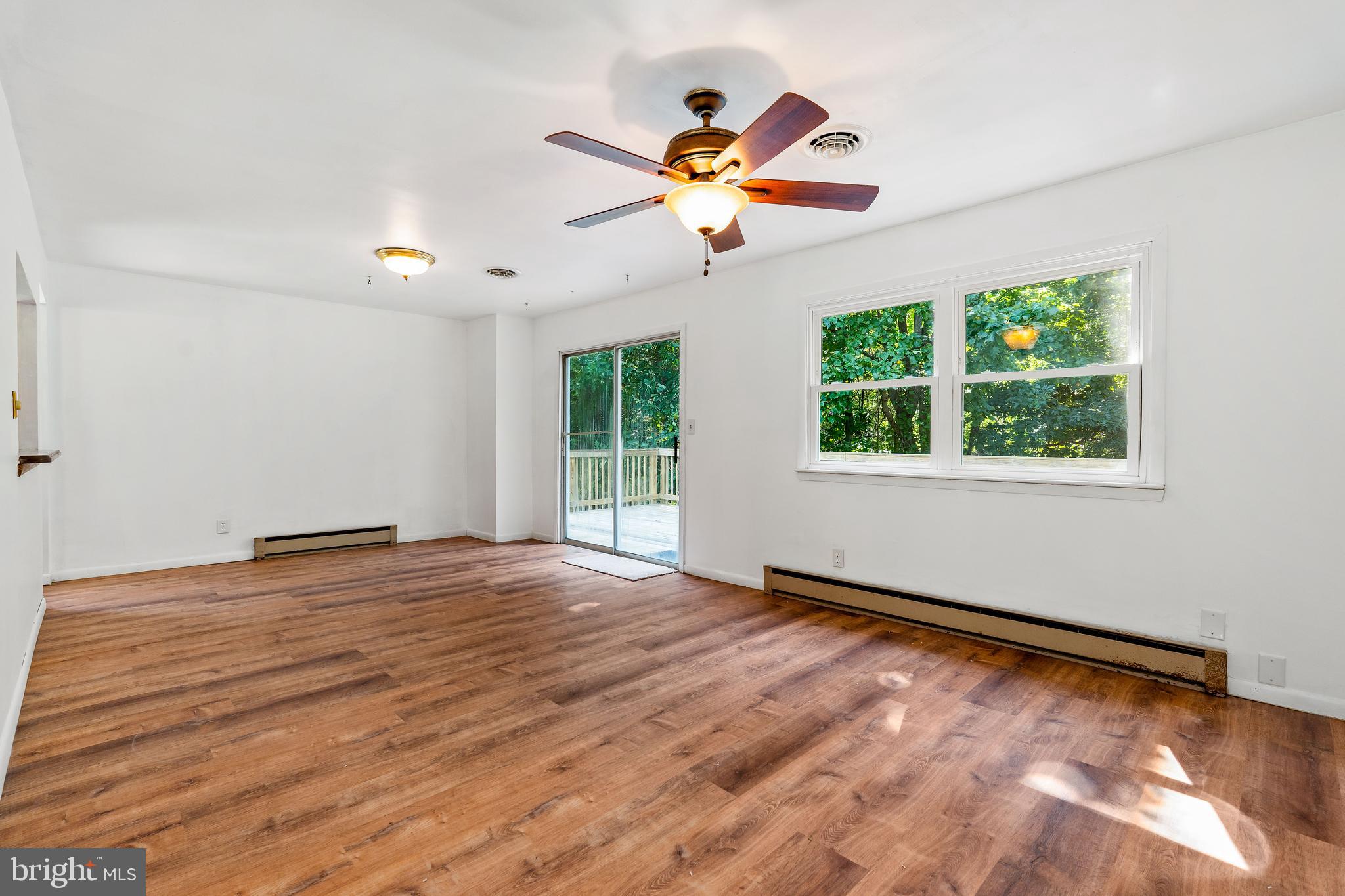106 Murray Road Elkton, MD 21921 - Photo 4 of 25 Living room with slider to back deck.