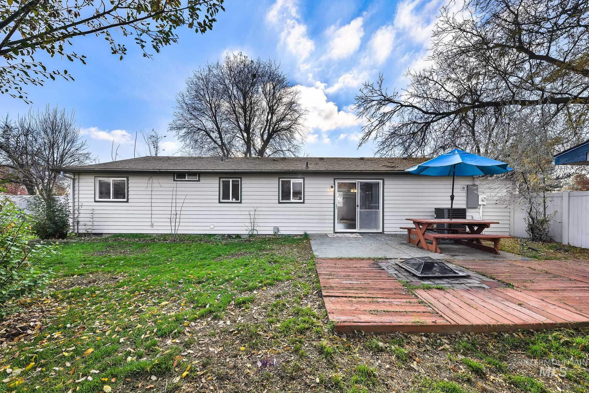 901 East 2nd Street South Middleton, ID 83644 - Photo 33 of 50 Back of house with an outdoor fire pit and a patio area