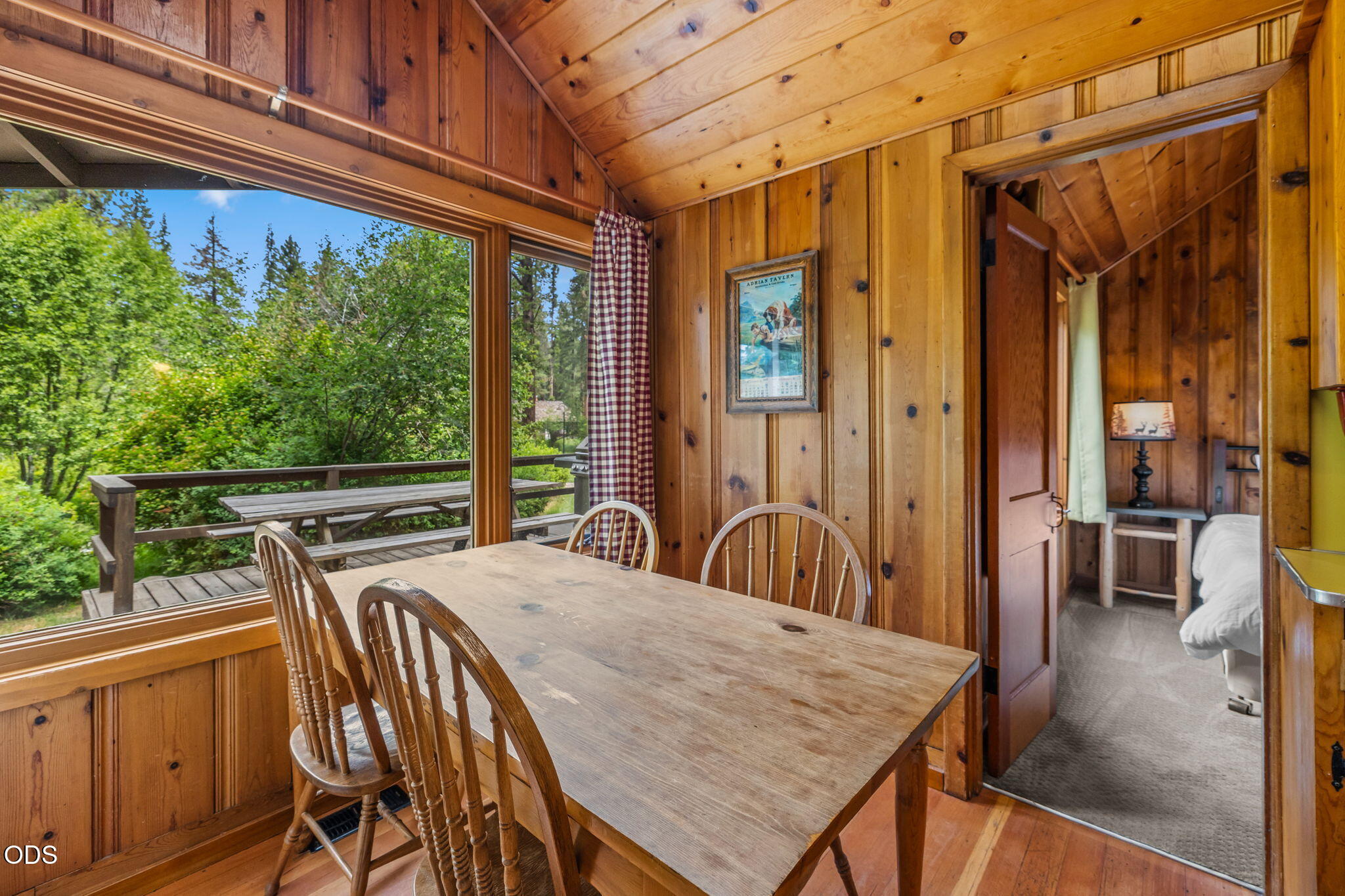 13375 Southwest Forest Service Road, Unit 3 U1 Camp Sherman, OR 97730 - Photo 18 of 29 a view of a balcony dining table and chairs