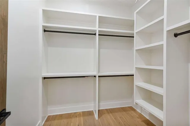 a view of an empty walk in closet