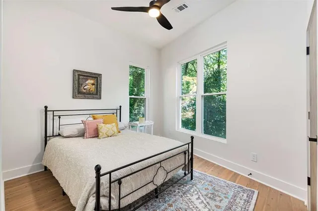 a bed room with a bed and a window