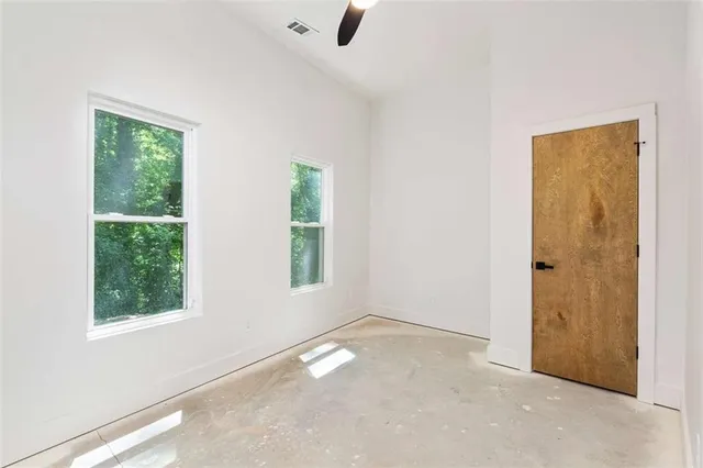 an empty room with windows