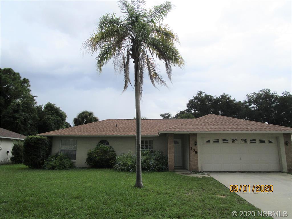 508 Sandpiper Court Edgewater, FL 32141 - Photo 1 of 10 a view of a house with a yard and potted plants