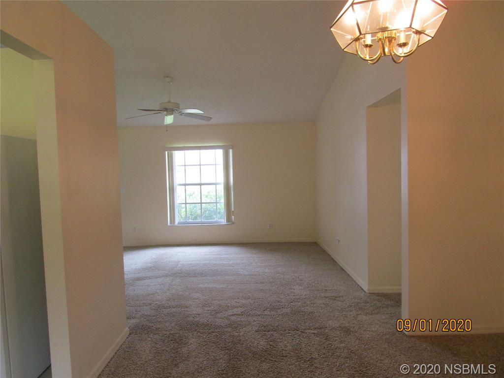 508 Sandpiper Court Edgewater, FL 32141 - Photo 4 of 10 an empty room with a window