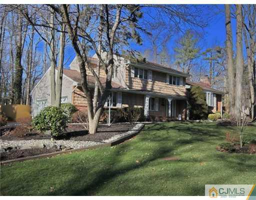 14 Golf Road Edison, NJ 08820 - Photo 1 of 20 a front view of a building with a garden