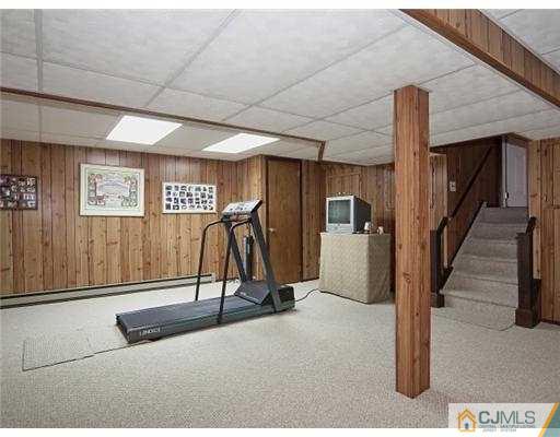 14 Golf Road Edison, NJ 08820 - Photo 16 of 20 a view of a room with gym equipment