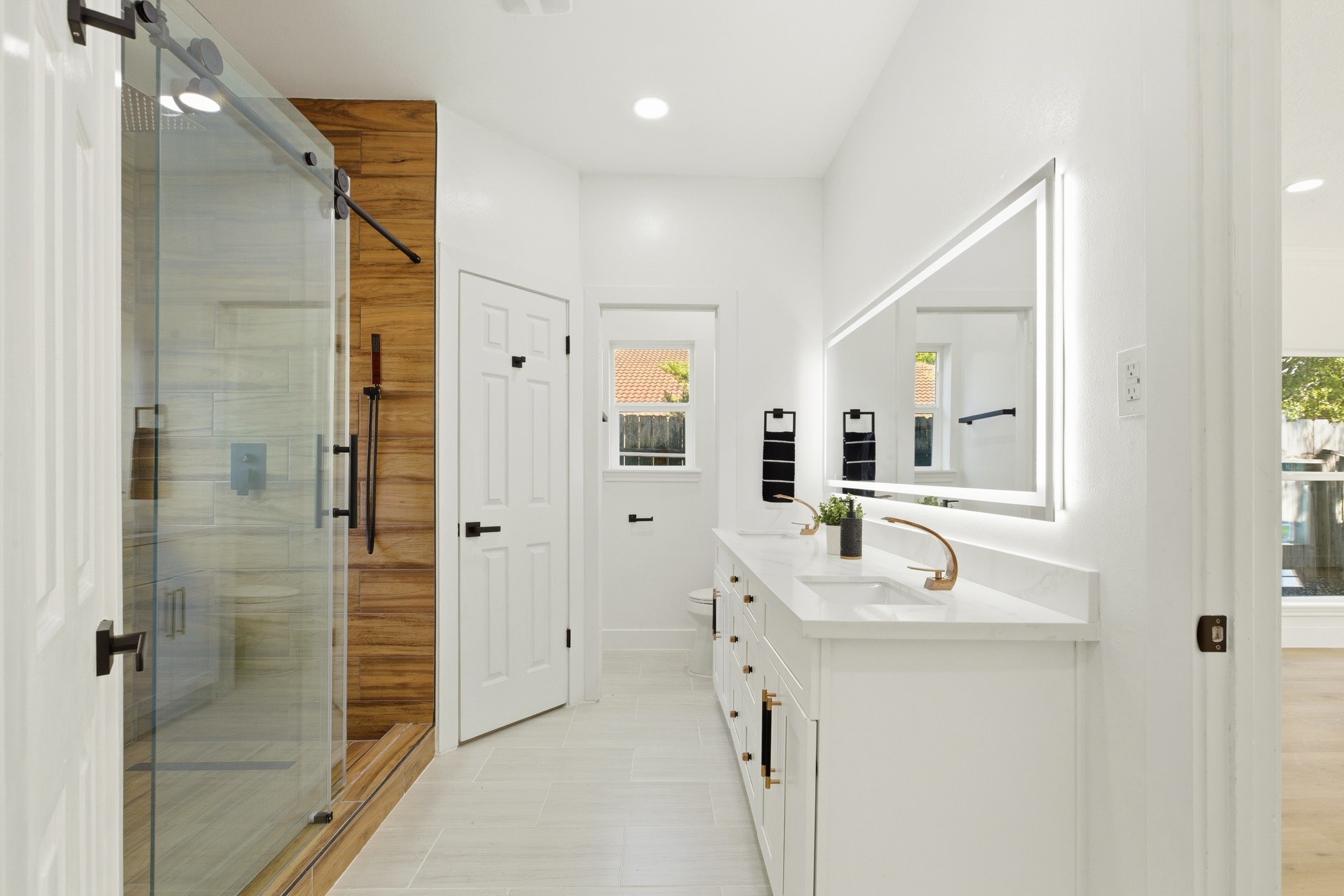 7338 San Ramon Drive Houston, TX 77083 - Photo 23 of 38 a bathroom with a sink and a mirror