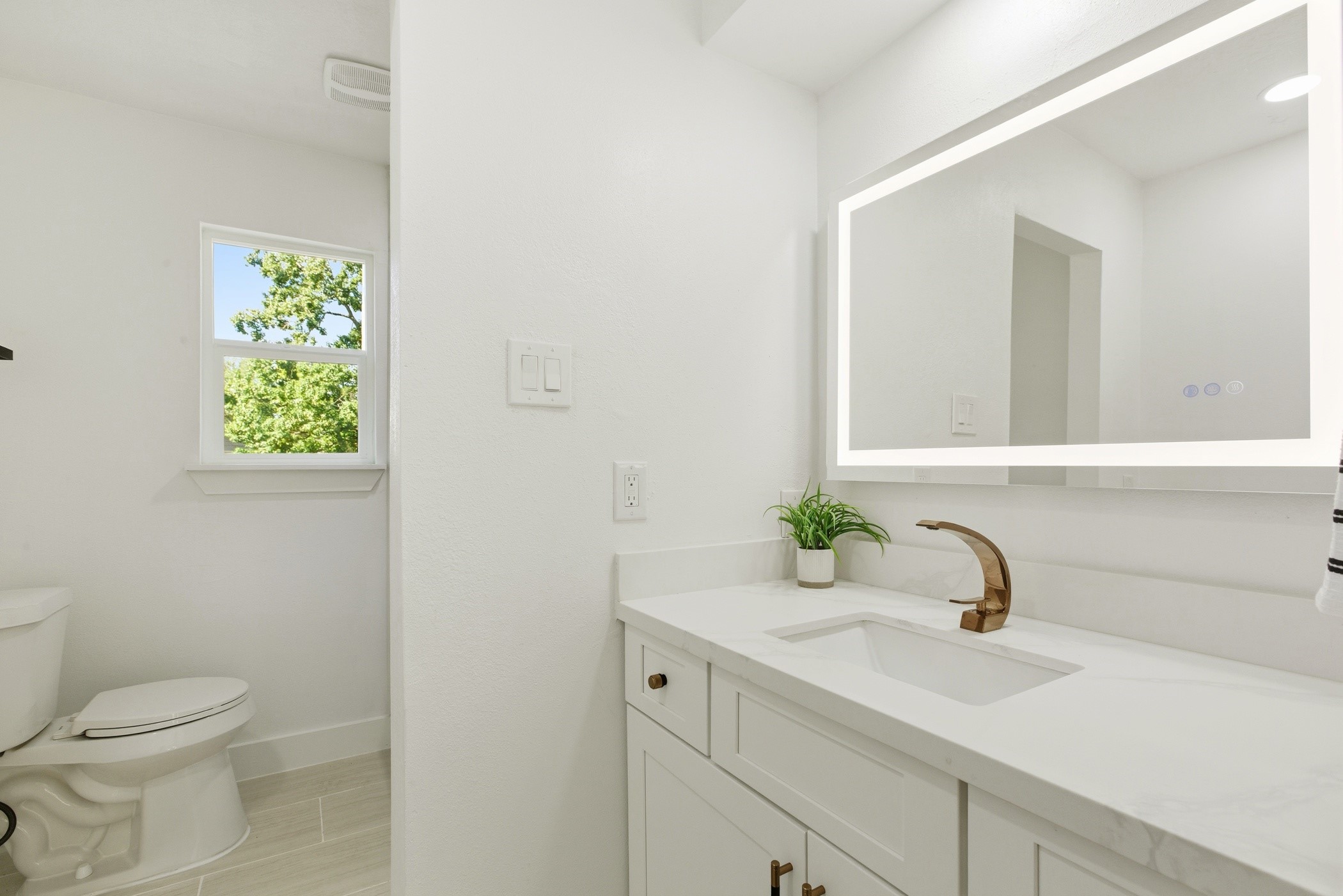 7338 San Ramon Drive Houston, TX 77083 - Photo 29 of 38 a bathroom with a sink and a toilet
