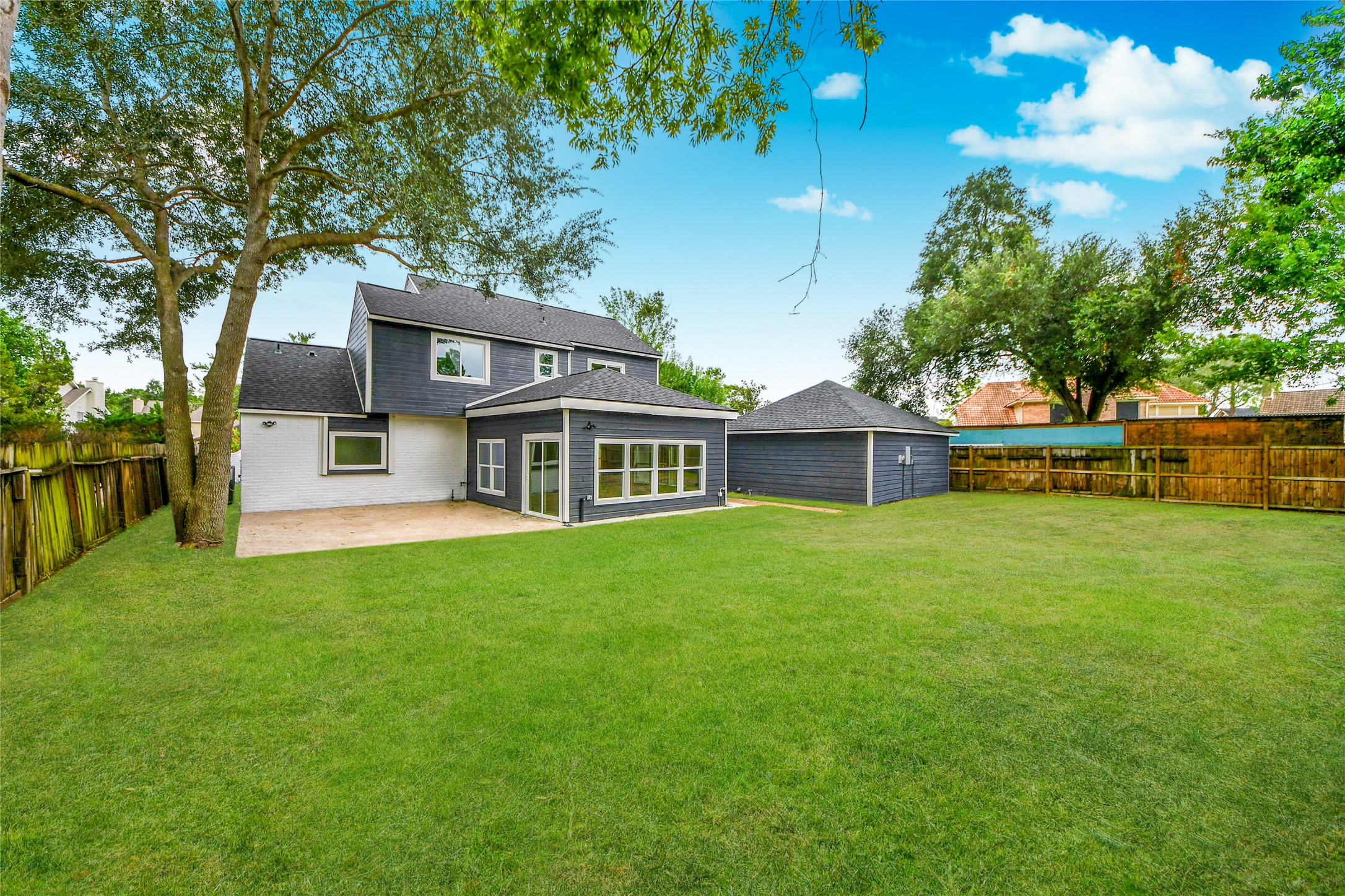 7338 San Ramon Drive Houston, TX 77083 - Photo 37 of 38 a front view of a house with a garden