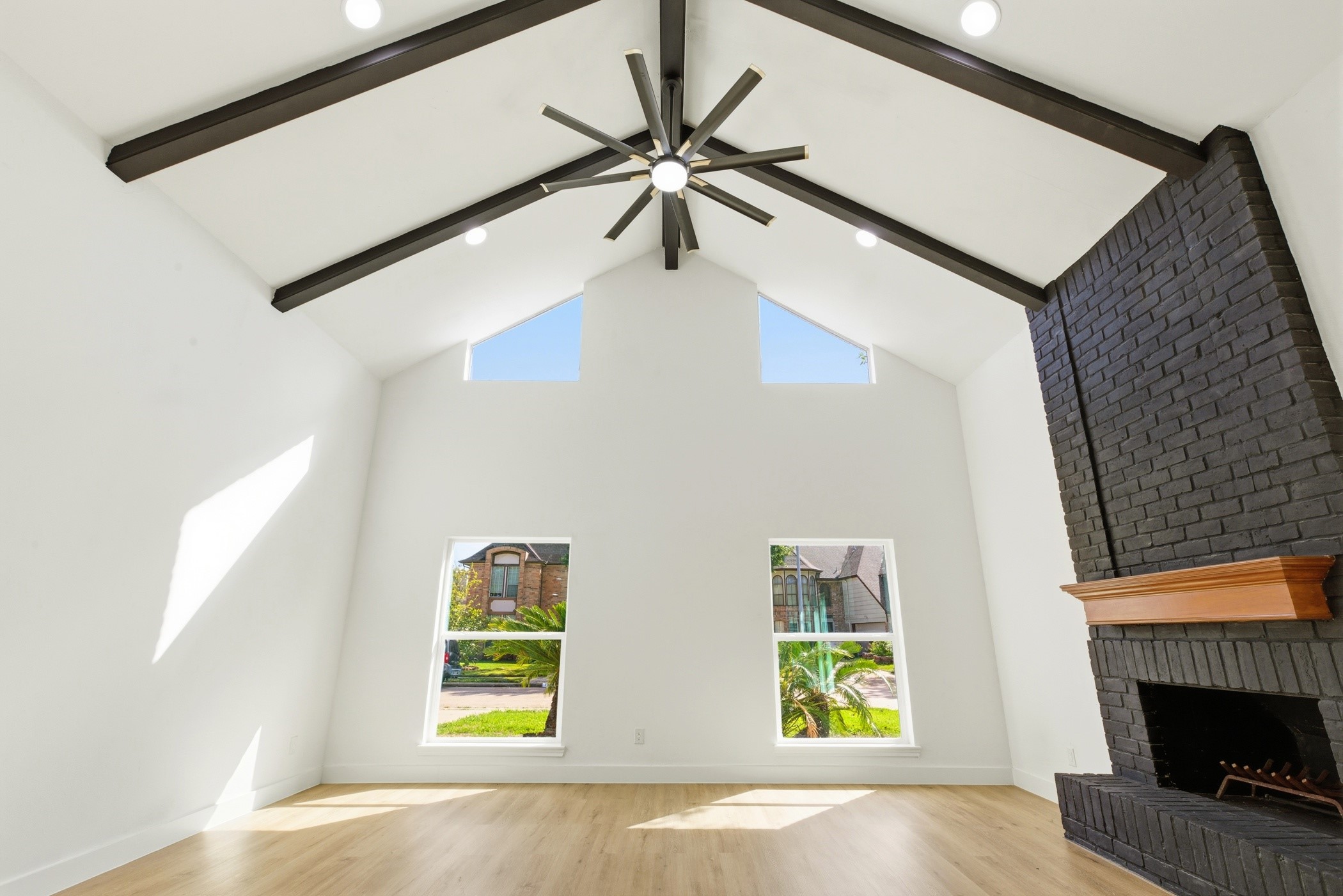 7338 San Ramon Drive Houston, TX 77083 - Photo 8 of 38 a view of room with window and fireplace