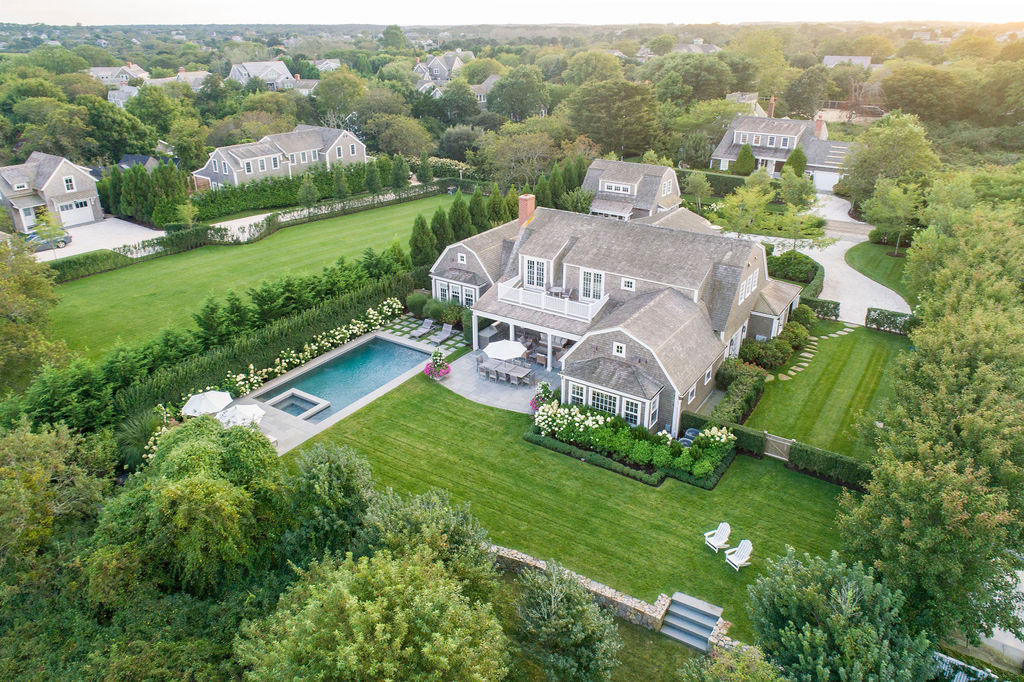 an aerial view of a house with a garden