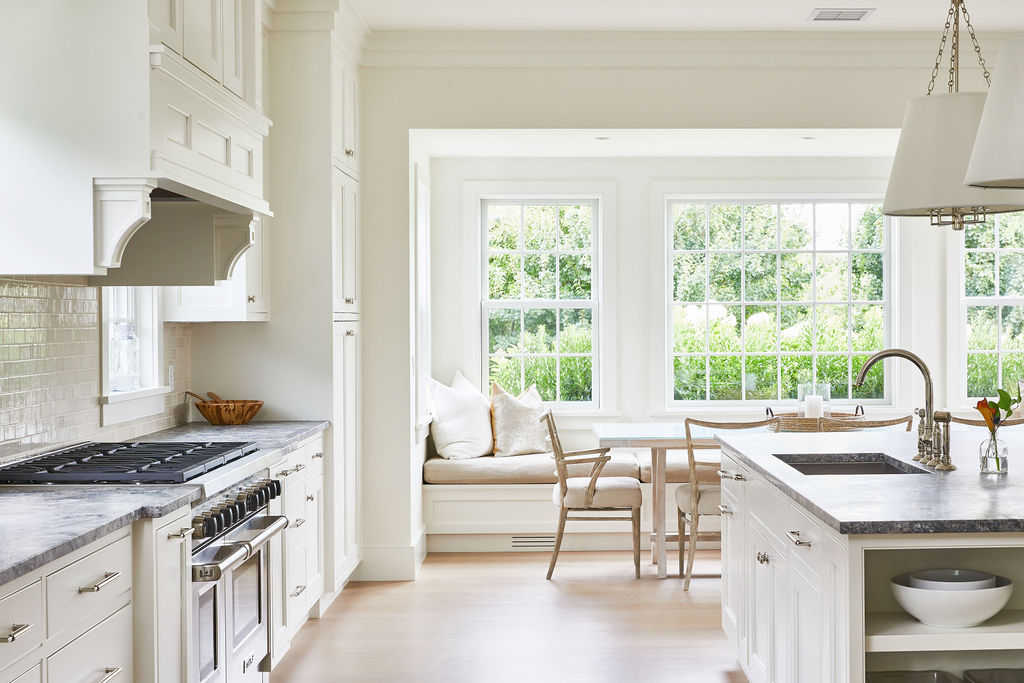 25 Pilgrim Road Nantucket, MA 02554 - Photo 11 of 28 a kitchen with a sink stove top oven and cabinets